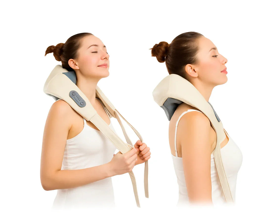 Woman wearing beige electric neck and shoulder massager with control panel, eyes closed in relaxation