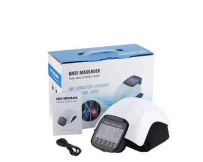 White and black knee massager device with digital display, packaging box, manual, and USB cable